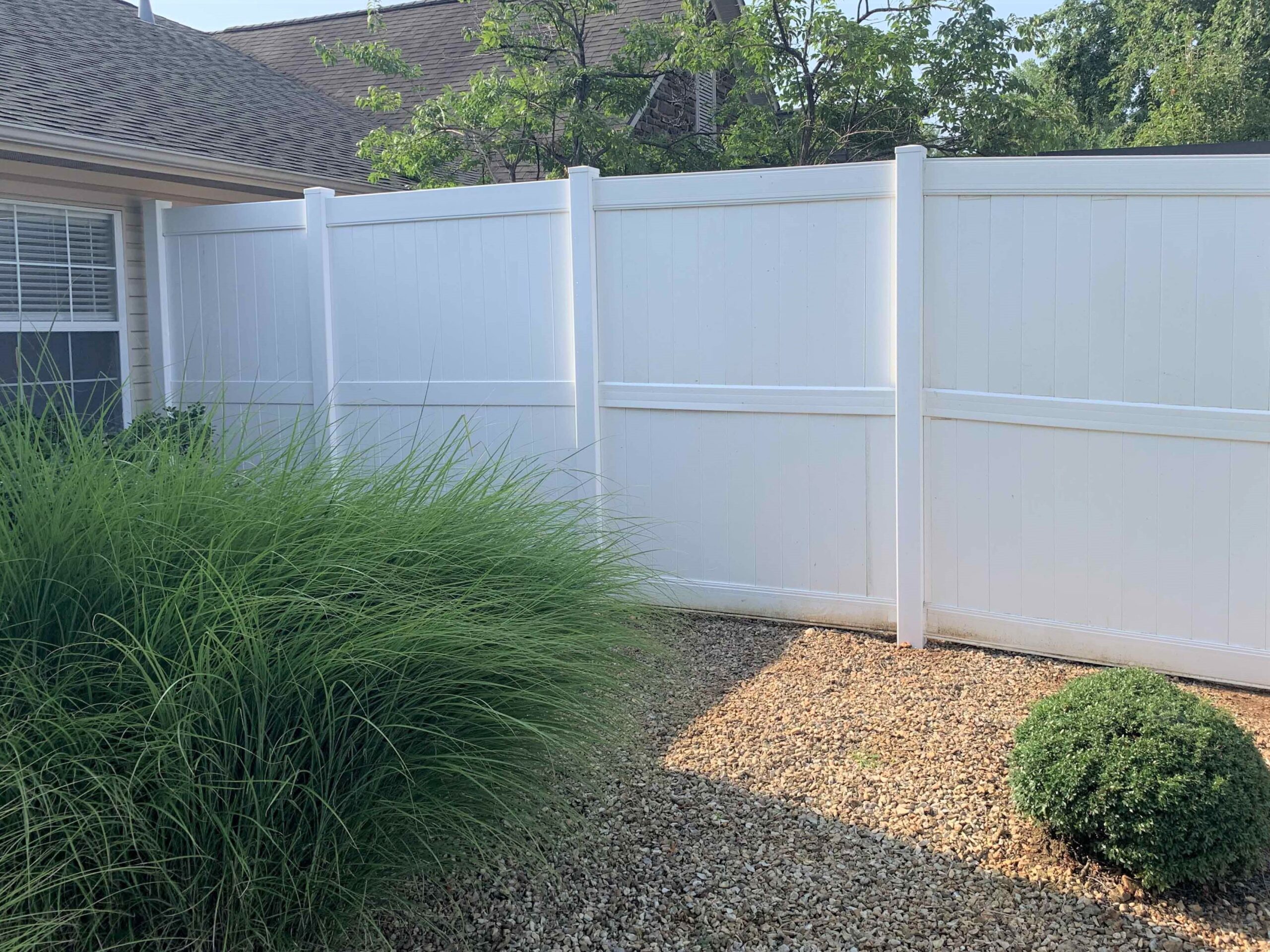 Photo of a vinyl privacy fence in Northwest Arkansas